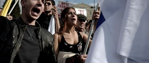 Grecii au ieșit din nou în stradă cu miile pentru a protesta împotriva măsurilor de austeritate