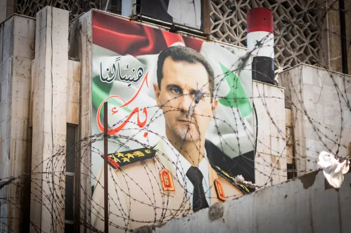 Afiș cu portretul dictatorului sirian, Bashar al-Assad. Sursa Foto: Shutterstock 