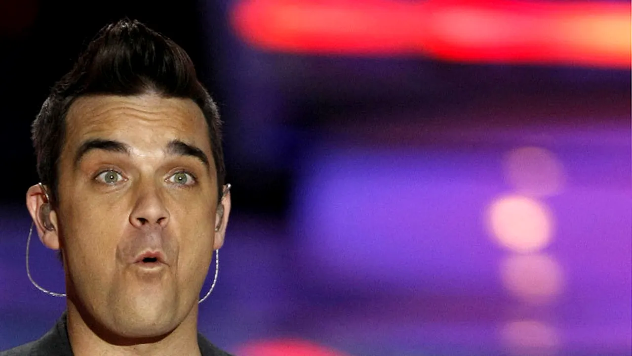 Robbie Williams spune că îmbătrânește și se transformă încet în tatăl său