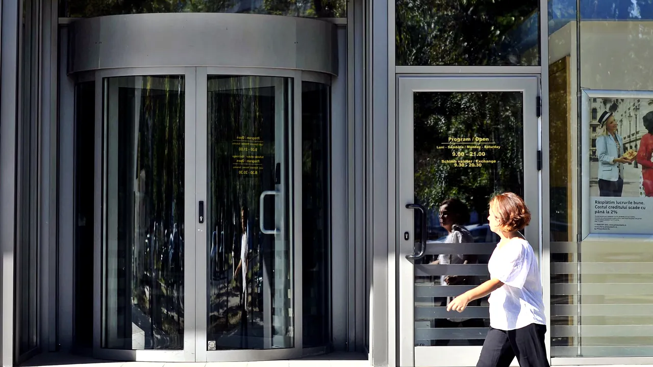 O bancă din România, cumpărată de americani, după un an de negocieri