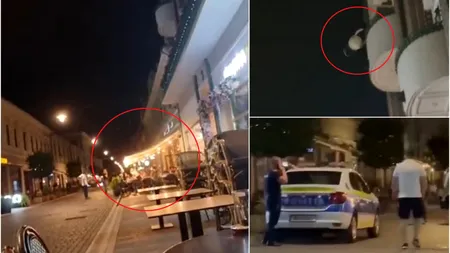 VIDEO | O femeie din Oradea a aruncat mai multe găleți cu apă de la etaj, peste clienții unei terase. Ce a deranjat-o pe locatară