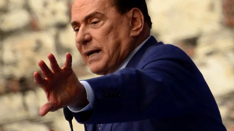 Berlusconi a fost huiduit de zeci de manifestanți în momentul sosirii la întrevederea cu liderul PD