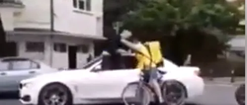 Un șofer din București a snopit în bătaie un biciclist care livra mâncare. Motivul încăierării - VIDEO