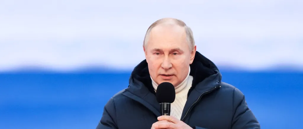 Deși se războiește cu Occidentul, Vladimir Putin este fanul hainelor de lux din Vest. Cât costă geaca cu care a apărut vineri la mega-manifestația de la Moscova