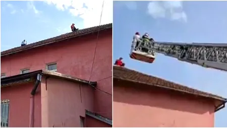 UPDATE - Cei doi angajați care amenințau că se aruncă de pe acoperișul Casei de Pensii din Petroșani au coborât de pe clădire. Ce nemulțumiri au aceștia
