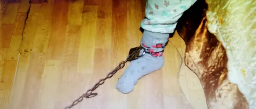 Fetiță de 10 ani din Dolj, legată cu lanțul de un picior chiar de bunica sa. Ce a pățit femeia