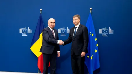 Bolojan merge astăzi la Bruxelles să discute problema deficitului bugetar și datoriei publice. Cu cine se întâlnește