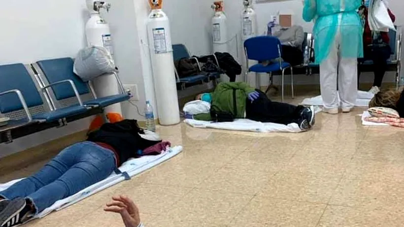 IMAGINI ȘOCANTE cu pacienți care așteaptă să fie consultați ÎNTINȘI pe podea/ Spania este a patra țară care a înregistrat peste 1.000 de decese  doar săptămâna trecută