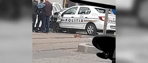 O mașină de poliție, implicată într-un accident în București. Un biciclist a fost rănit