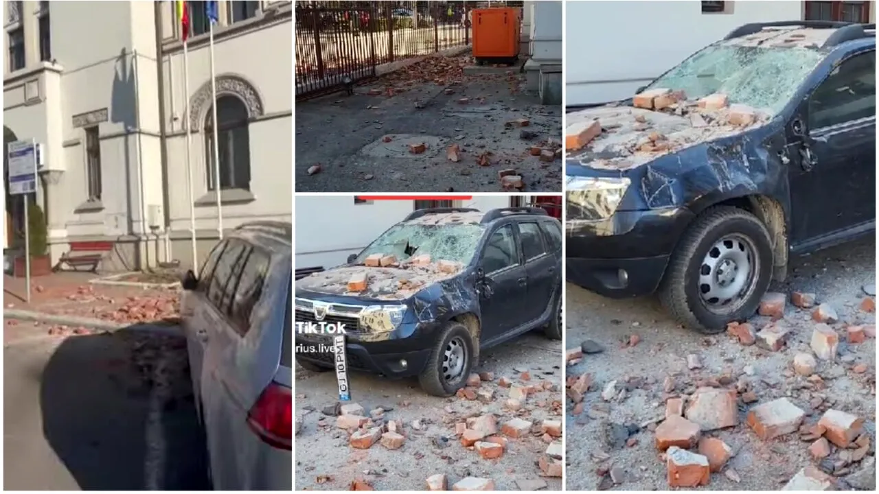 VIDEO | Bucăți de tencuială au căzut peste mașini la Târgu Jiu. Clădirea Primăriei a fost evacuată