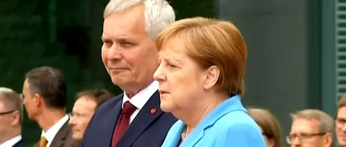 Angela Merkel, surprinsă tremurând pentru a treia oară în ultimele săptămâni