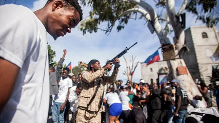 Peste o sută de persoane au fost MASACRATE în Haiti. Un lider de bandă era convins că bătrânii din zonă au folosit VOODOO pentru a îi ucide copilul