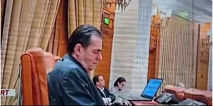 VIDEO | Ludovic Orban, filmat în timp ce doarme dus la ședința solemnă din Parlament