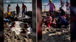 Turiștii au săpat o groapă uriașă în calea valurilor, iar pământul s-a surpat. Salvamarul a intervenit în ultimul moment