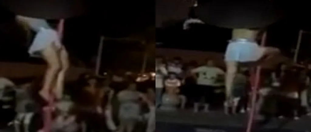 INCREDIBIL. Scene șocante lângă o școală: O dansatoare la bară se mișcă lasciv în timp ce doi copii aplaudă - VIDEO