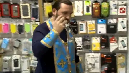 Un preot din Georgia a sfințit iPhone-ul, pe care localnicii îl consideră ''telefonul diavolului''