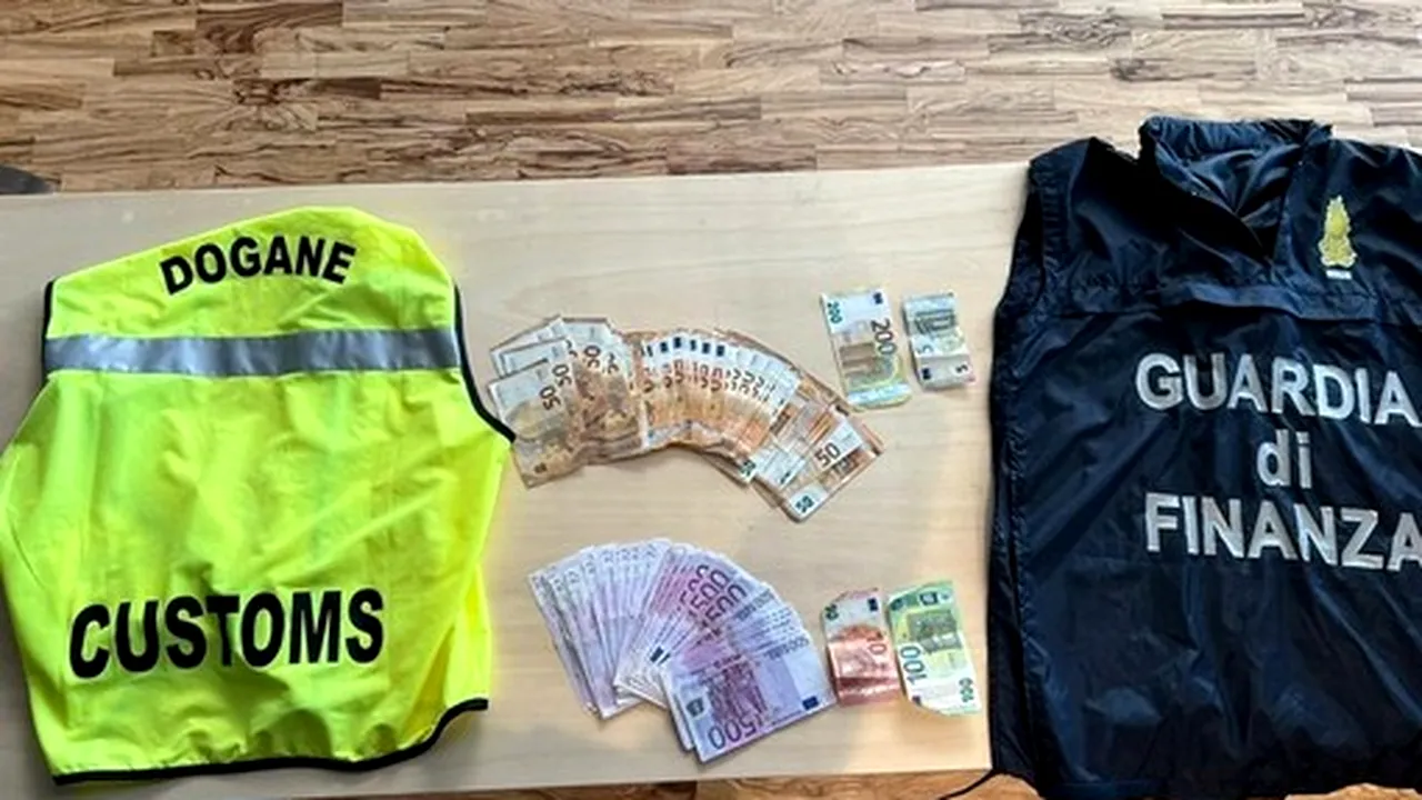 Un român a fost prins cu 23.000 de euro nedeclarați pe un aeroport din Italia. Ce se va întâmpla cu banii