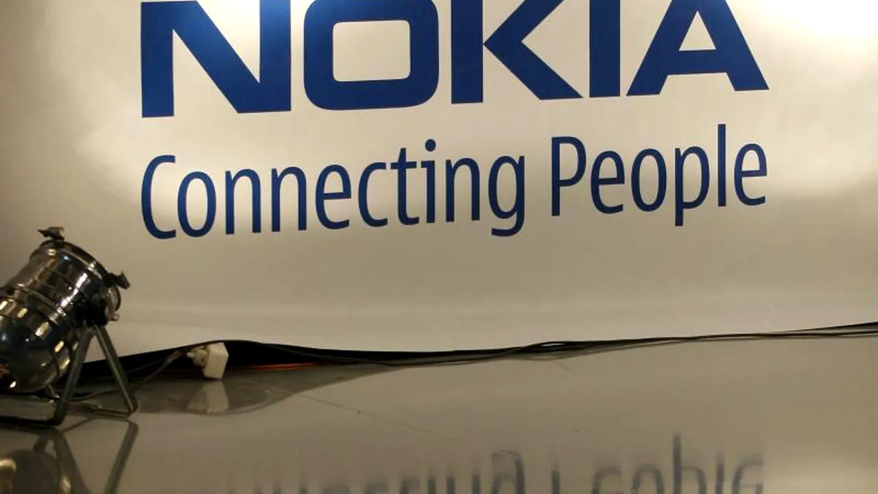Nokia analizează o fuziune cu Alcatel-Lucent
