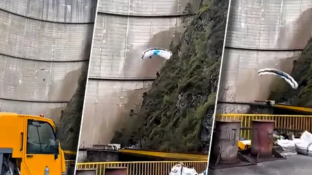 Moment neașteptat la Barajul Vidraru: un parapantist a surprins muncitorii din zonă
