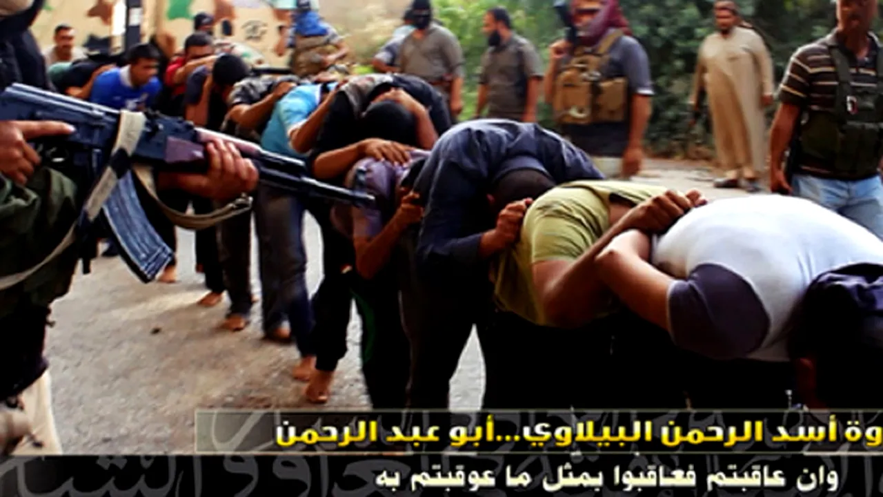 SIIL publică imagini cu zeci de militari irakieni executați - GALERIE FOTO