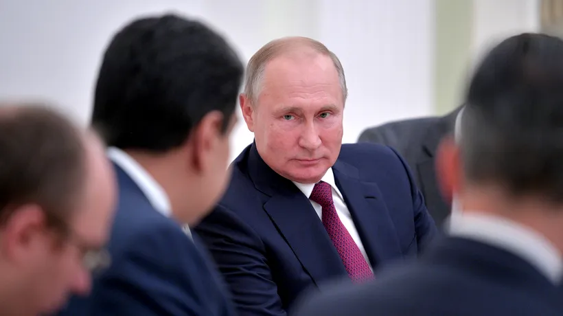 Fost spion KGB, Vladimir Putin îl trage de urechi pe șeful MI6