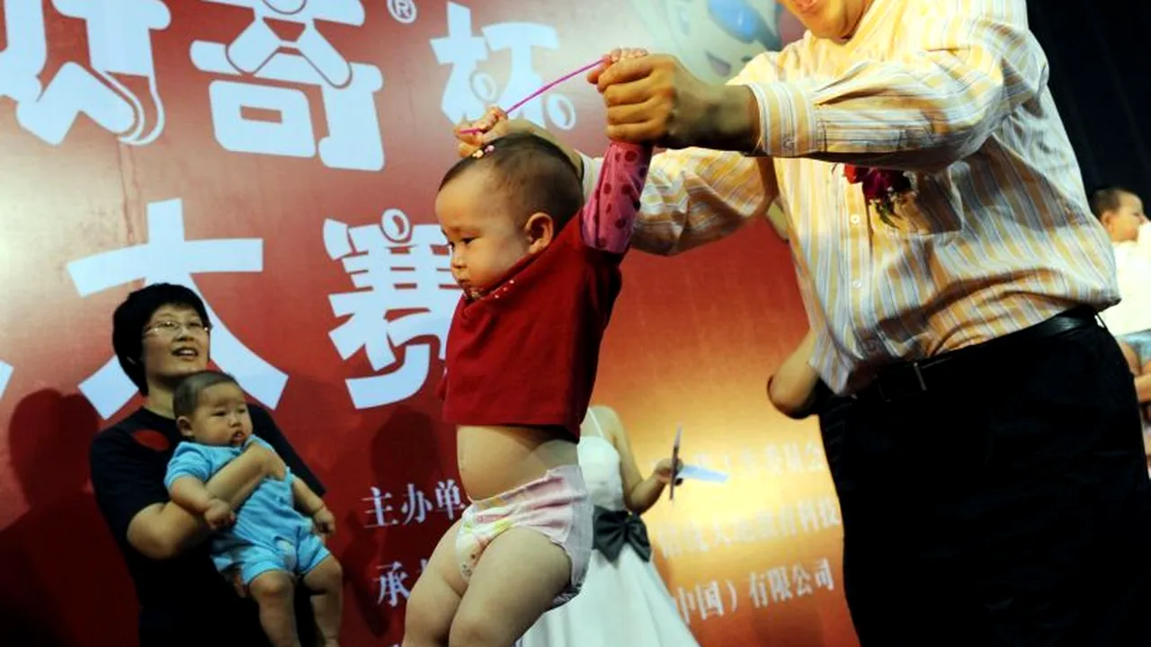 Amendă record pentru un cuplu chinez care a făcut al doilea copil