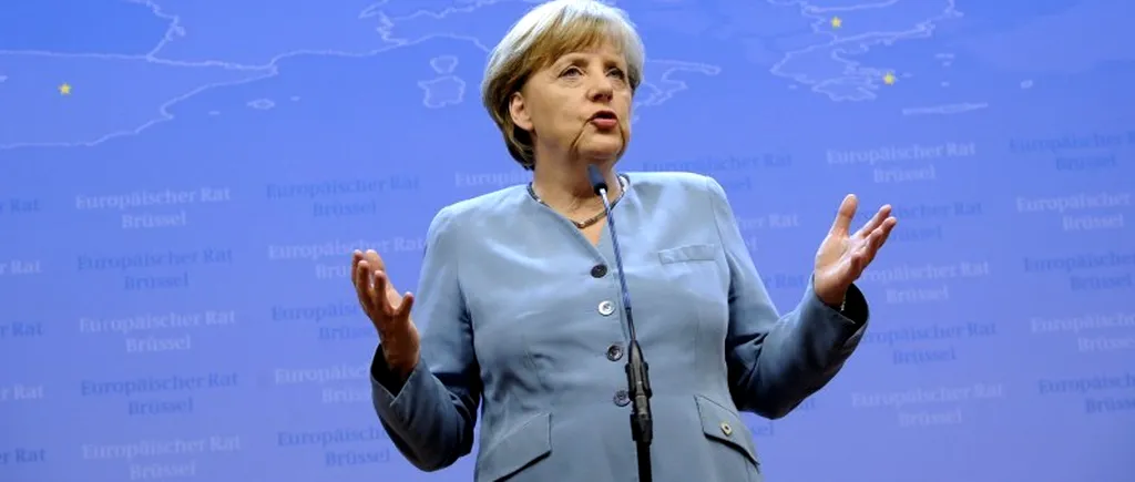 Angela Merkel, surprinsă într-o fotografie având pe față o umbră similară mustății lui Hitler - FOTO