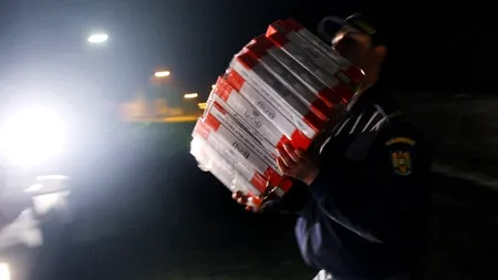 Doi contrabandiști de țigări, reținuți după percheziții în București și Ilfov
