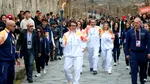 Celebrul actor Jackie Chan a purtat flacăra olimpică prin inima orașului antic Pompeii