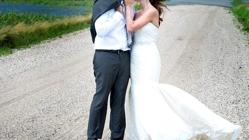 Este aceasta cea mai spectaculoasă fotografie de nuntă? DETALIUL din spatele tinerilor căsătoriți