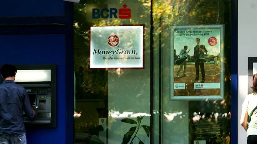 Moody's a coborât ratingurile BCR și Raiffeisen Bank 