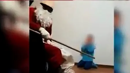 Imagini revoltătoare. Un copil din Bistrița, amenințat de un bărbat deghizat în Moș Nicolae, sub privirile mamei care filma momentul