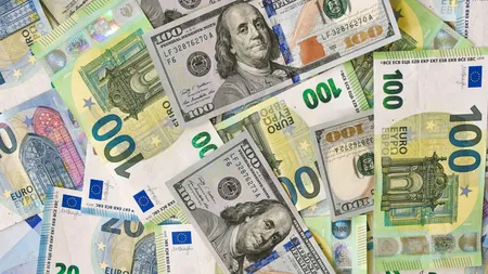 Moneda euro, în cădere liberă pentru prima dată din 2002. Valorează sub un dolar american