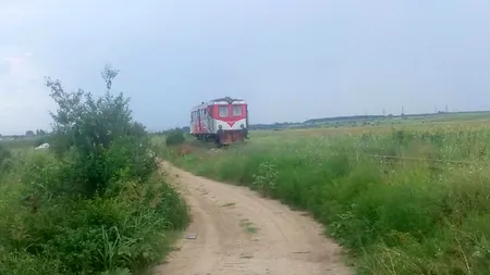 Patru răniți, după ce un tren a lovit un TIR. Șoferul camionului, rănit grav
