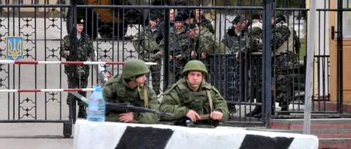 Observatorii OSCE, blocați de către persoane înarmate la intrarea în Crimeea