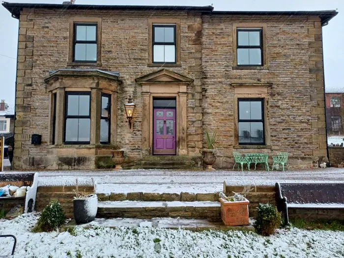 Greystonedale Mansion after it was restored by Joanne Shiels and her partner Geoff Bell. Photo released May 12 2025. A retired couple have transformed a once 'derelict' 140-year-old mansion into a stunning �1 million party house. Joanne Shiels, 60, and her partner Geoff Bell, 61, bought the crumbling Greystonedale Mansion in Haltwhistle, Northumberland, for �300,000 in May 2022. Over next 24 months they gave the eight bedroom property some much-needed TLC investing �220,000 for a complete refurbishment. They fitted it with its very own �disco kitchen�, a games room, and a replanted the one-acre private garden - it also fits up to 14 guests.,Image: 998380824, License: Rights-managed, Restrictions: Editorial use, commercial use may require additional licenses. We don't use AI to make images which could be mistaken for news photos. AI use will be clearly indicated. Supplied on condition you ensure personal data is processed in compliance with UK GDPR, Model Release: no, Credit line: Courtesy Joanne Shiels / SWNS / SWNS / Profimedia