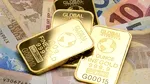 După ce a depășit pragul de 5.000 dolari pe uncie, aurul se apropie de un nou maxim istoric. Investitorii caută siguranță după slăbirea dolarului