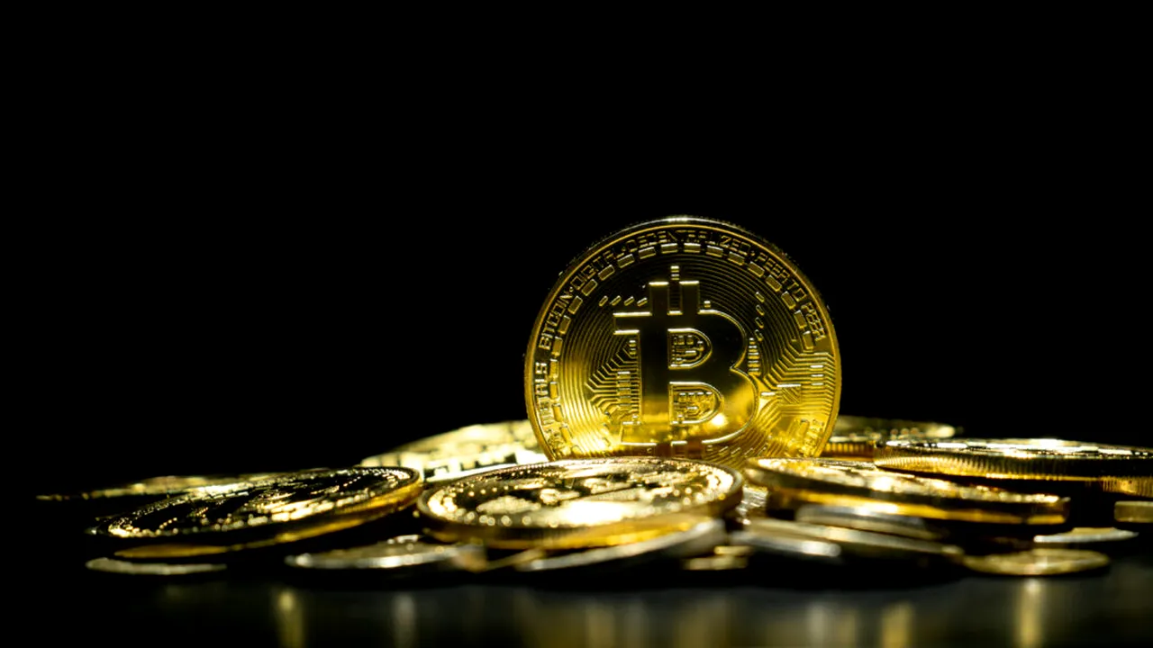 BITCOIN scade de la MAXIME record! Primele reacții după 