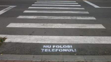 PMP Constanța vrea interzicerea folosirii telefoanelor și căștilor pe trecerea de pietoni