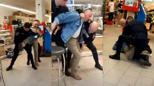 Bărbat înarmat cu un cuțit, pus la pământ de polițiști într-un supermarket din Sibiu - VIDEO