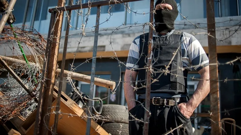 CRIZĂ ÎN UCRAINA. Militanți separatiști proruși ocupă televiziunea regională de la Donețk