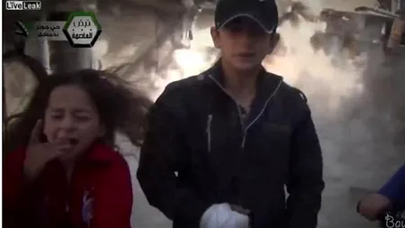 Momentul tulburător în care copiii din Siria povestesc cum au învățat să se apere pentru a nu fi răniți, iar în spatele lor explodează o bombă. VIDEO
