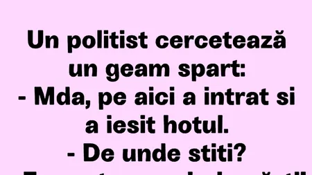 BANCUL ZILEI | Un polițist cercetează un geam spart