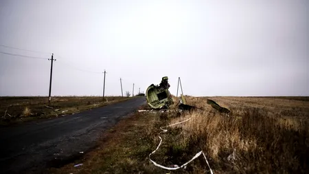 Vladimir Putin acuză forțele ucrainene că bombardează zona unde s-a prăbușit avionul MH17