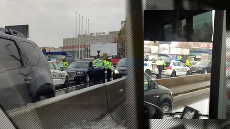 FOTO-VIDEO | Un nou „bombardier” pe străzile din București. Șoferul beat și fără permis al unui Chrysler nu a oprit la semnalul Poliției și apoi s-a baricadat în mașină. Imagini din timpul intervenției