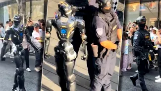 Robo-polițiștii în China. În Shenzhen, mulțimi de oameni s-au adunat pentru a-i urmări pe roboți la lucru