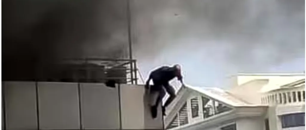 VIDEO: Un bărbat a sărit de la etajul 4, după ce un incendiu a izbucnit în cafeneaua în care lucra / Imaginile au devenit virale