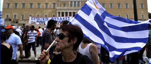 Femeile de serviciu au forțat creditorii Greciei să iasă din sediul Finanțelor pe scara de incendiu