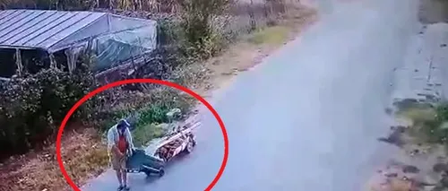 Bărbat mort, din Constanța, dus de fiul său la cimitir într-un cărucior tras de un tomberon (VIDEO)
