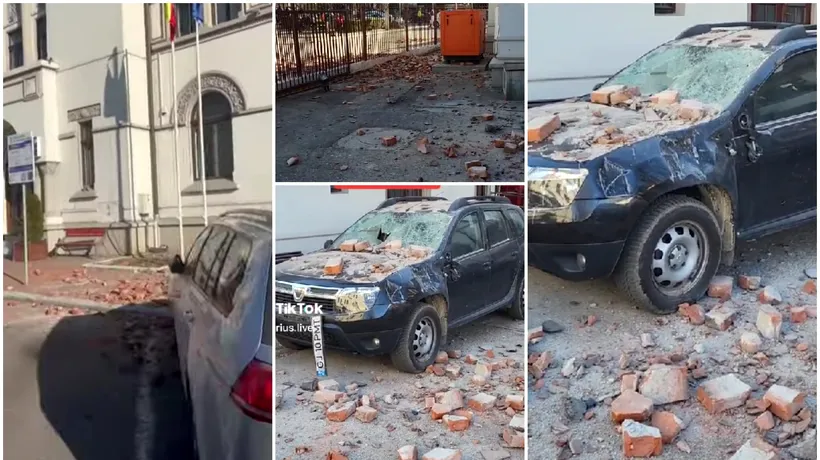 VIDEO | Bucăți de tencuială au căzut peste mașini la Târgu Jiu. Clădirea Primăriei a fost evacuată